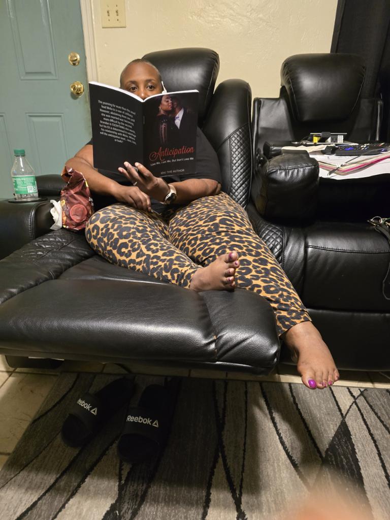 Reading my book at home